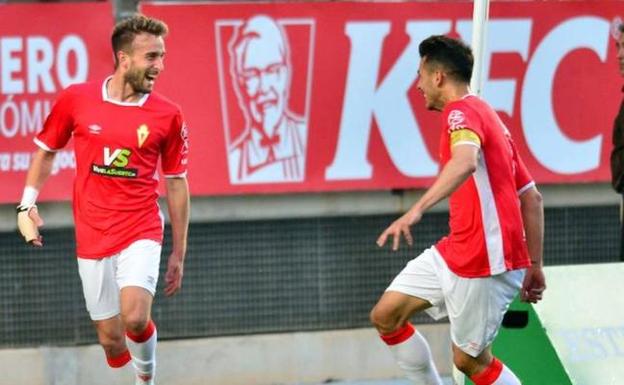 Jugadores del Murcia celebran un gol/Guillermo Carrión / AGM