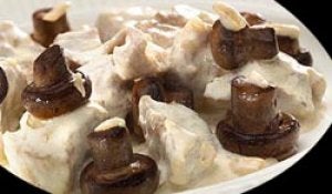 Ternera en salsa blanca con champiñones
