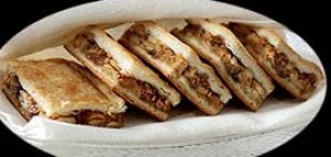 Empanada de bacalao con pasas de Corinto