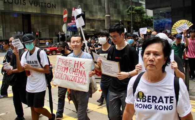 Maratón de protestas en Hong Kong para presionar al G-20 contra la ley de extradición a China