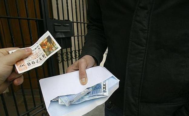 Dos detenidos en Málaga por estafar en Murcia y Cartagena con el 'timo del tocomocho'
