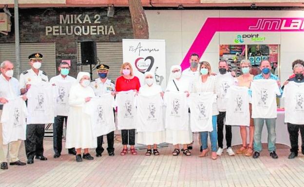 Con Juan Pablo II por bandera