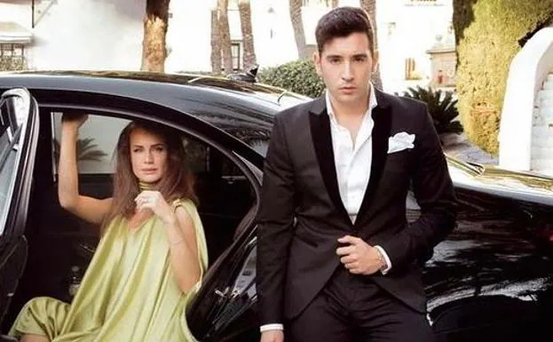 Marcos Villafruela poses with a model with one of his designs. 