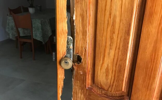 Door busted in one of the homes attacked in districts. 