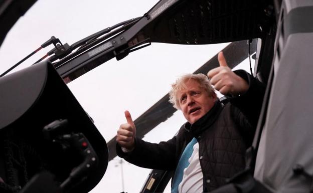 Boris Johnson, in a helicopter during a visit to the armed forces. 