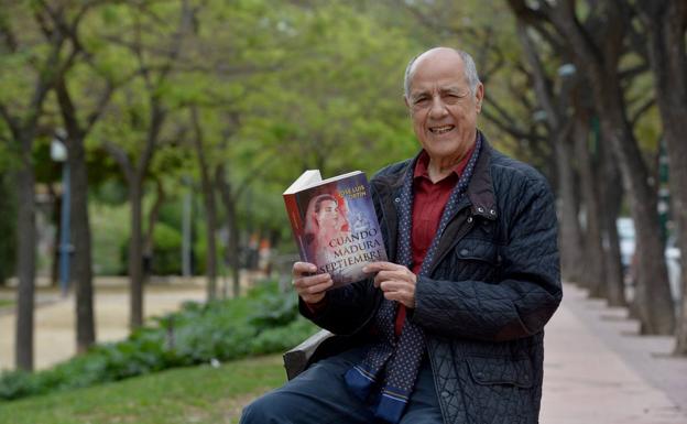 José Luis Ortín poses with his first novel. 