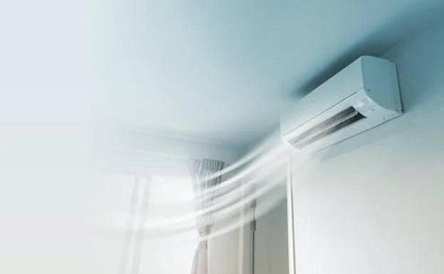 Stock image of an air conditioner in operation. 