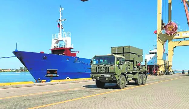 A truck from RAAA 73, with missile launchers, disembarks in the port of Riga. 