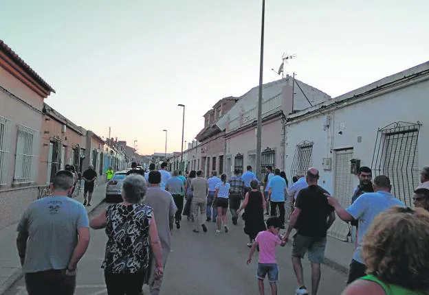 A large group of residents of La Aljorra patrolling the streets of the town, in a photo from earlier this week. 