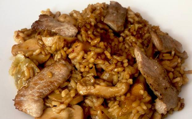 Arroz con secreto ibérico y boletus