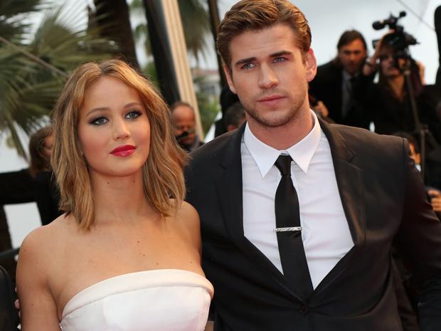 Jennifer Lawrence, entre Liam Hemsworth y Chris Martin