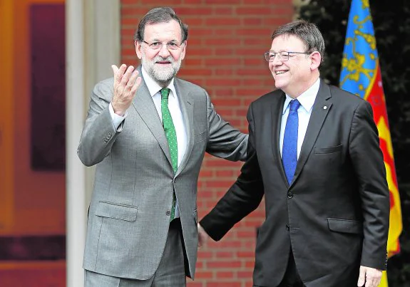 Rajoy pacta con Puig enviar 1.300 millones pendientes del FLA 2014 para cerrar el año