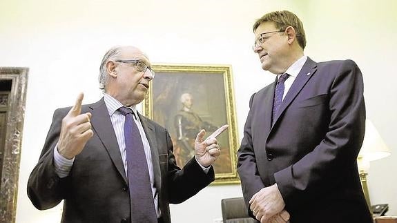 Puig se reunirá con Montoro para hablar del FLA y de la multa de la UE