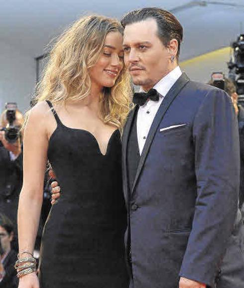 Depp dará 6,2 millones a su ex